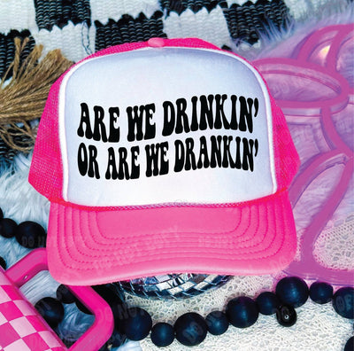 Are We Drinkin' or Are We Drankin' DTF Printed Neon Pink & White Trucker Hat  from Southern Attitude Designs Inc