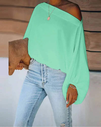 Lantern sleeve skew neck top  from Flarix
