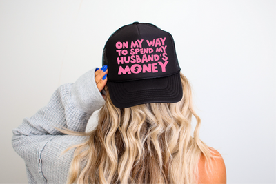 On My Way To Spend My Husbands Money DTF Printed on Foam Black Trucker Hat  from Southern Attitude Designs Inc